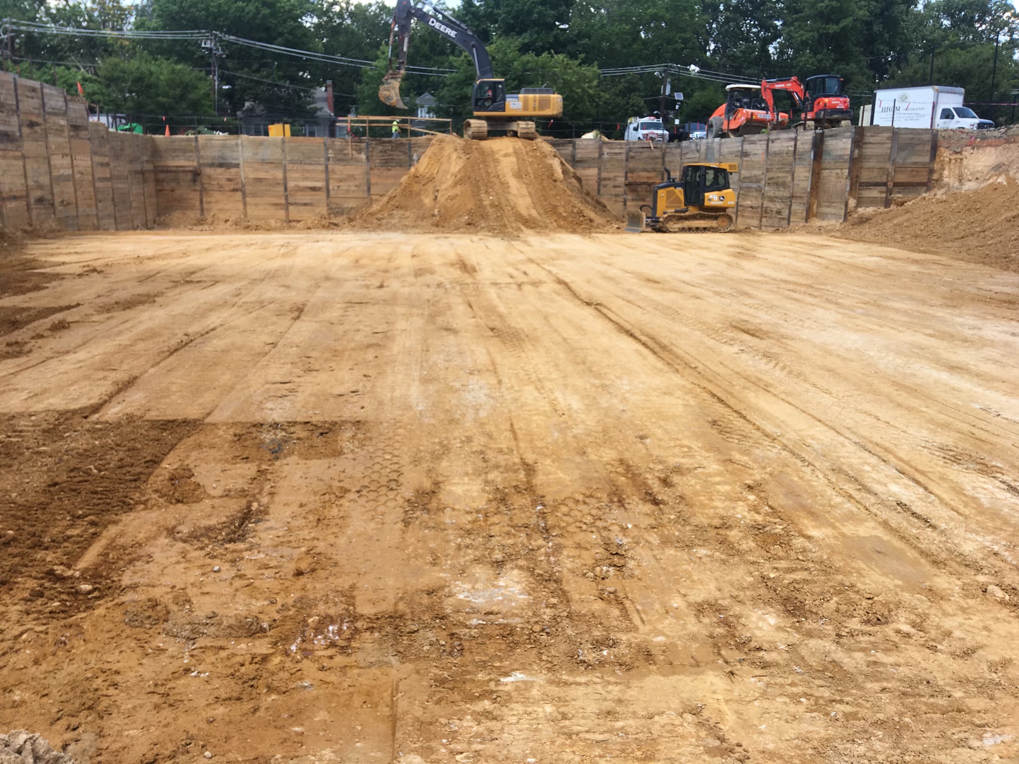 Large excavation and site preparation project with heavy equipment
